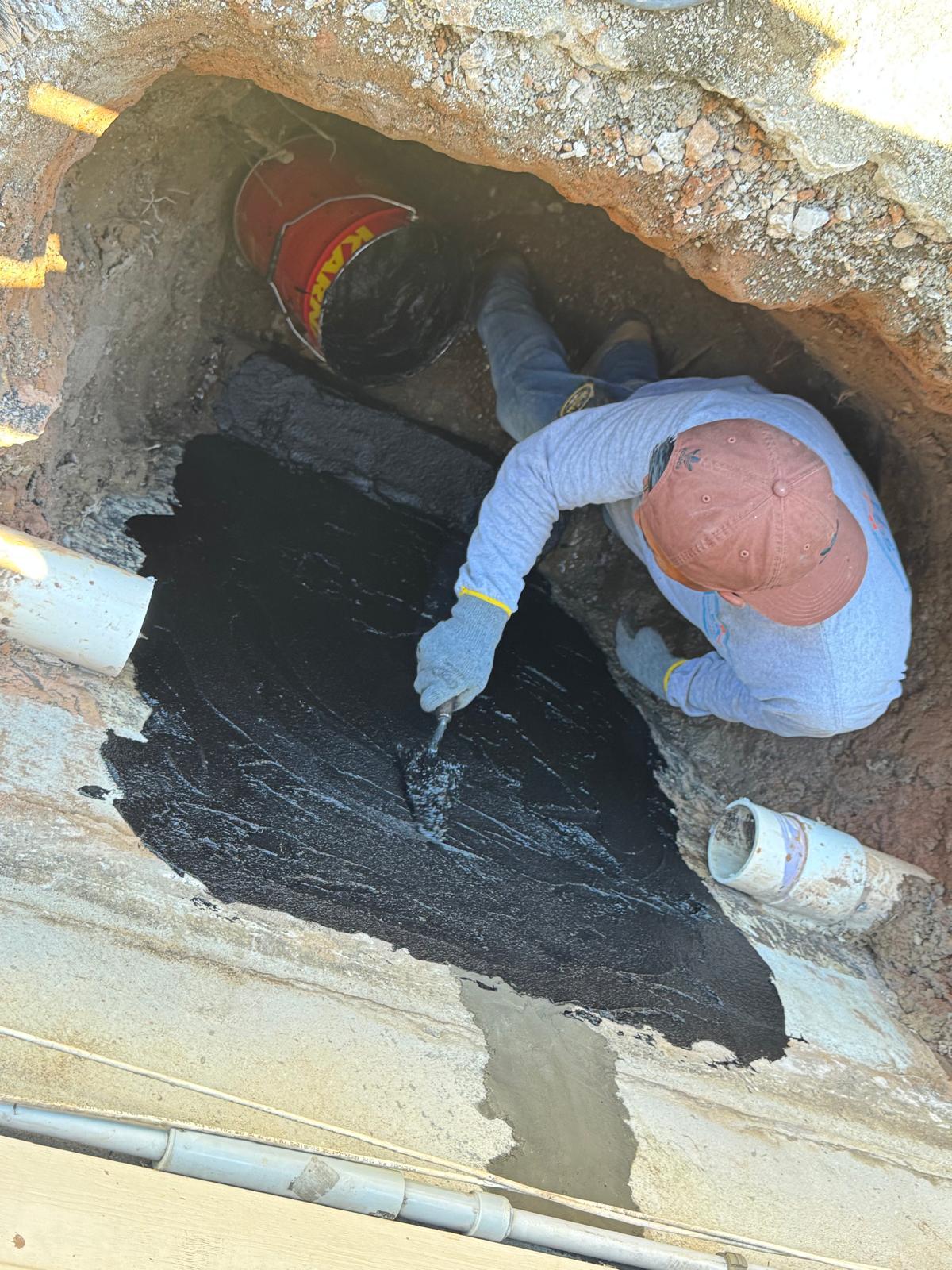 Waterproofing application around an exterior foundation wall